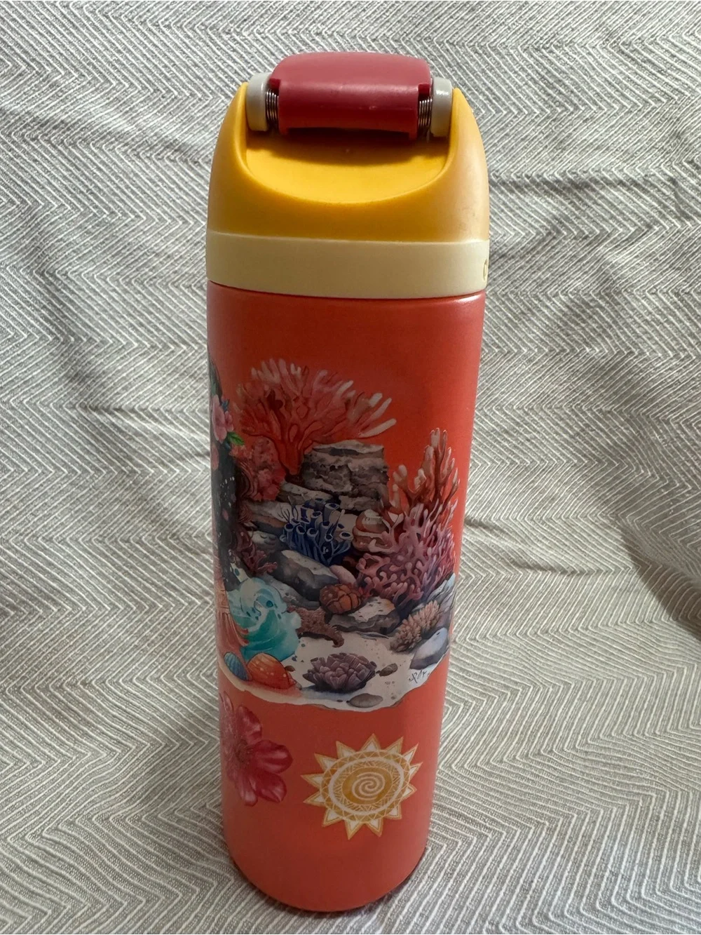 Owala Stainless Steel Water Bottle with Moana graphic design.
